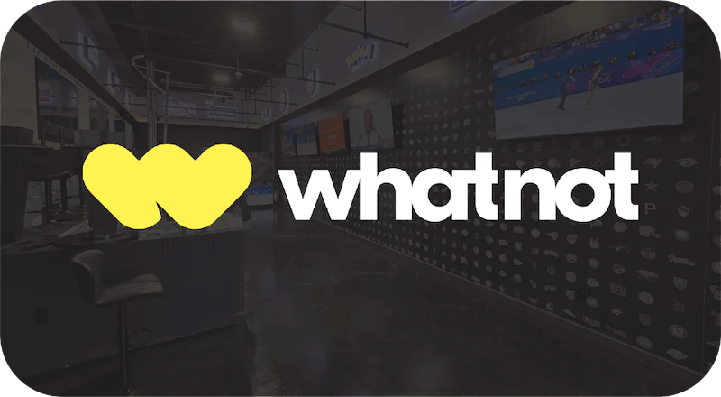 Whatnot logo with a blurred office background